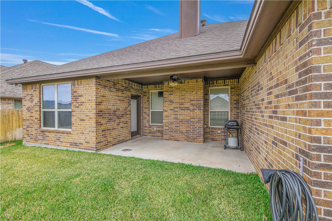 3049 Embers Loop Bryan, TX 77808 - Photo 20 of 21 a view of a backyard with a garden