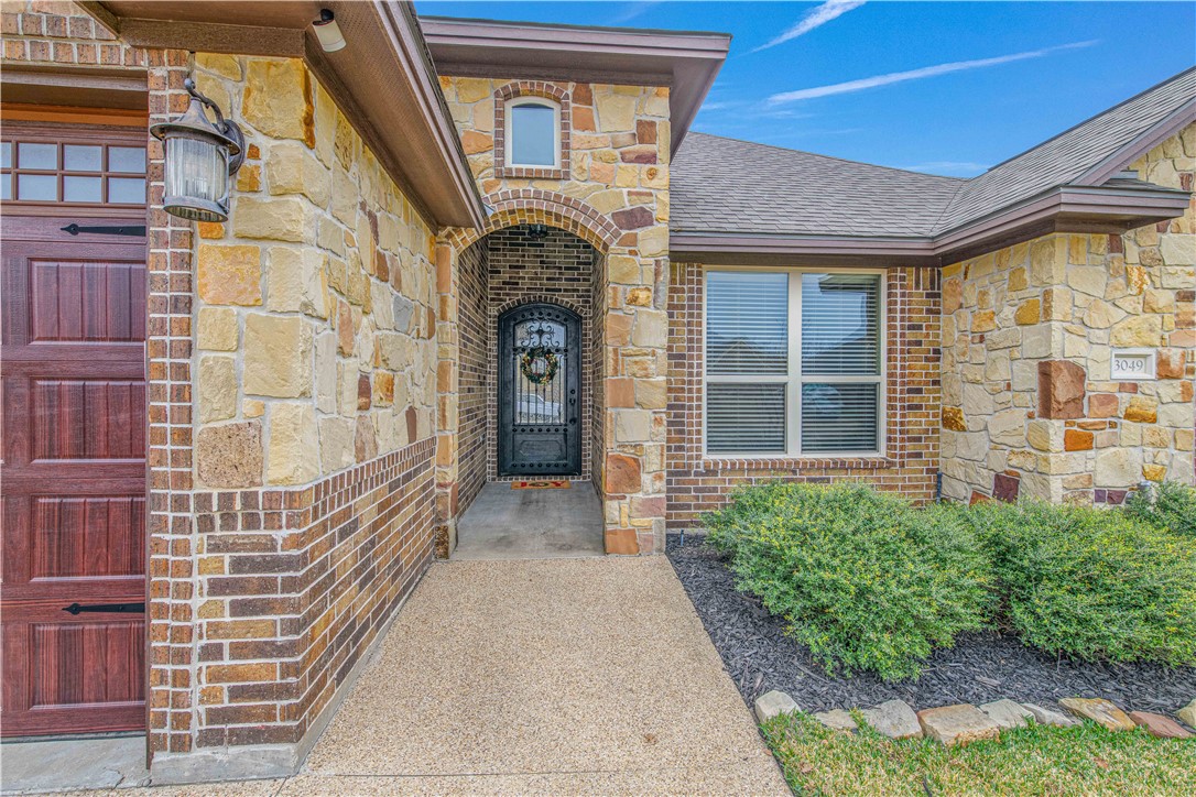3049 Embers Loop Bryan, TX 77808 - Photo 3 of 21 a view of front door of house with stairs