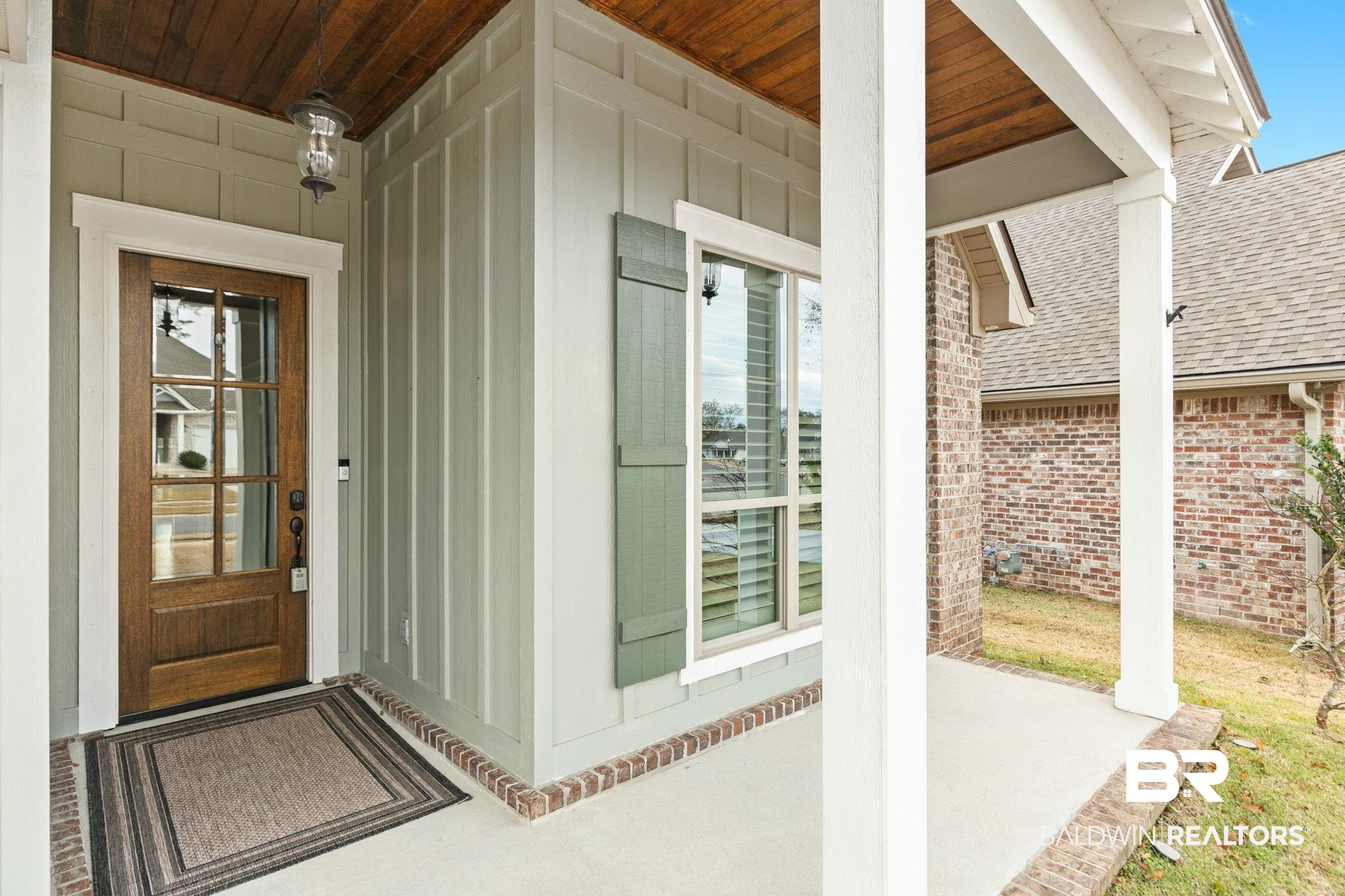 31654 Canopy Loop Daphne, AL 36527 - Photo 7 of 64 Doorway to property featuring a shingled roof and a porch