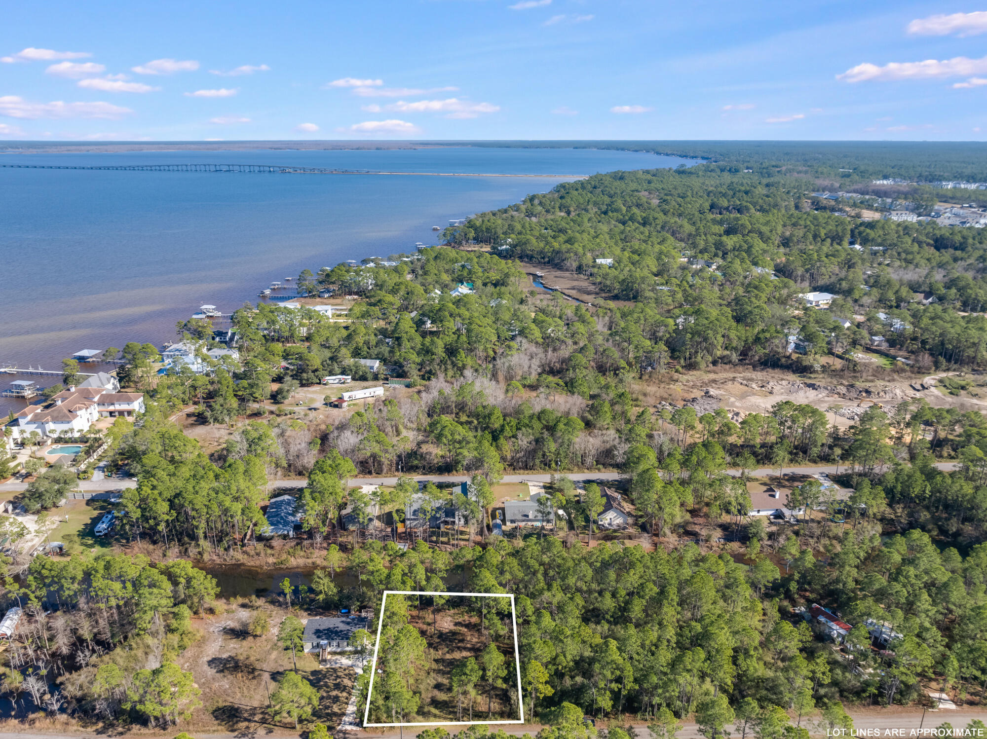 Lot 25 Rendezvous Drive Santa Rosa Beach, FL 32459 - Photo 12 of 21 a view of a lake with a mountain