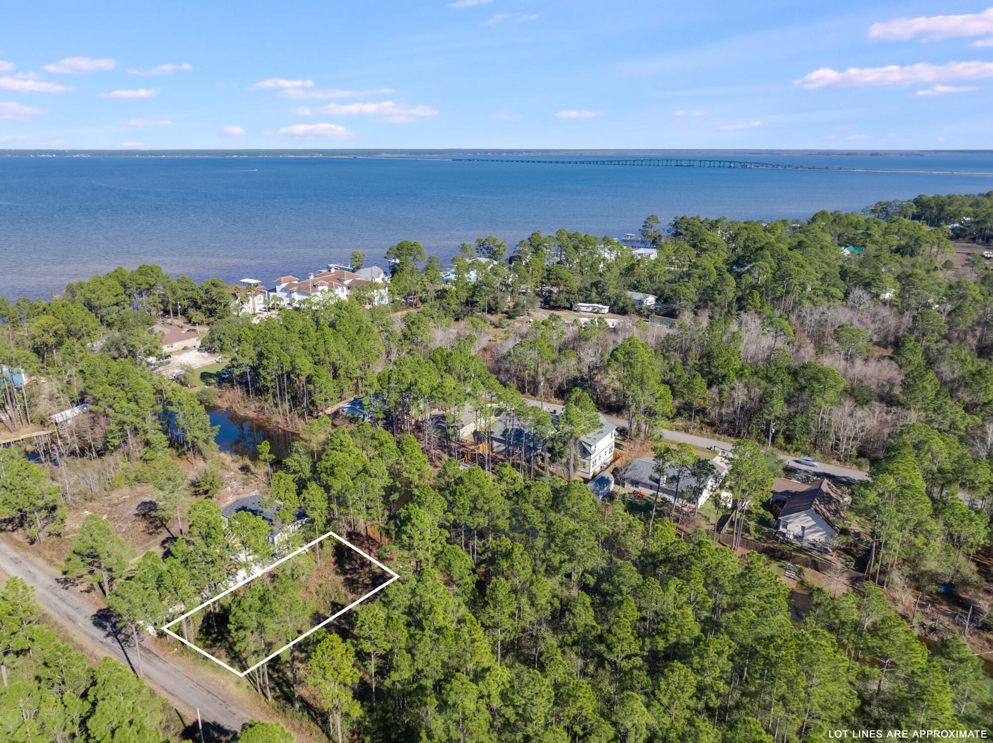 Lot 25 Rendezvous Drive Santa Rosa Beach, FL 32459 - Photo 3 of 21 an aerial view of a houses with a yard