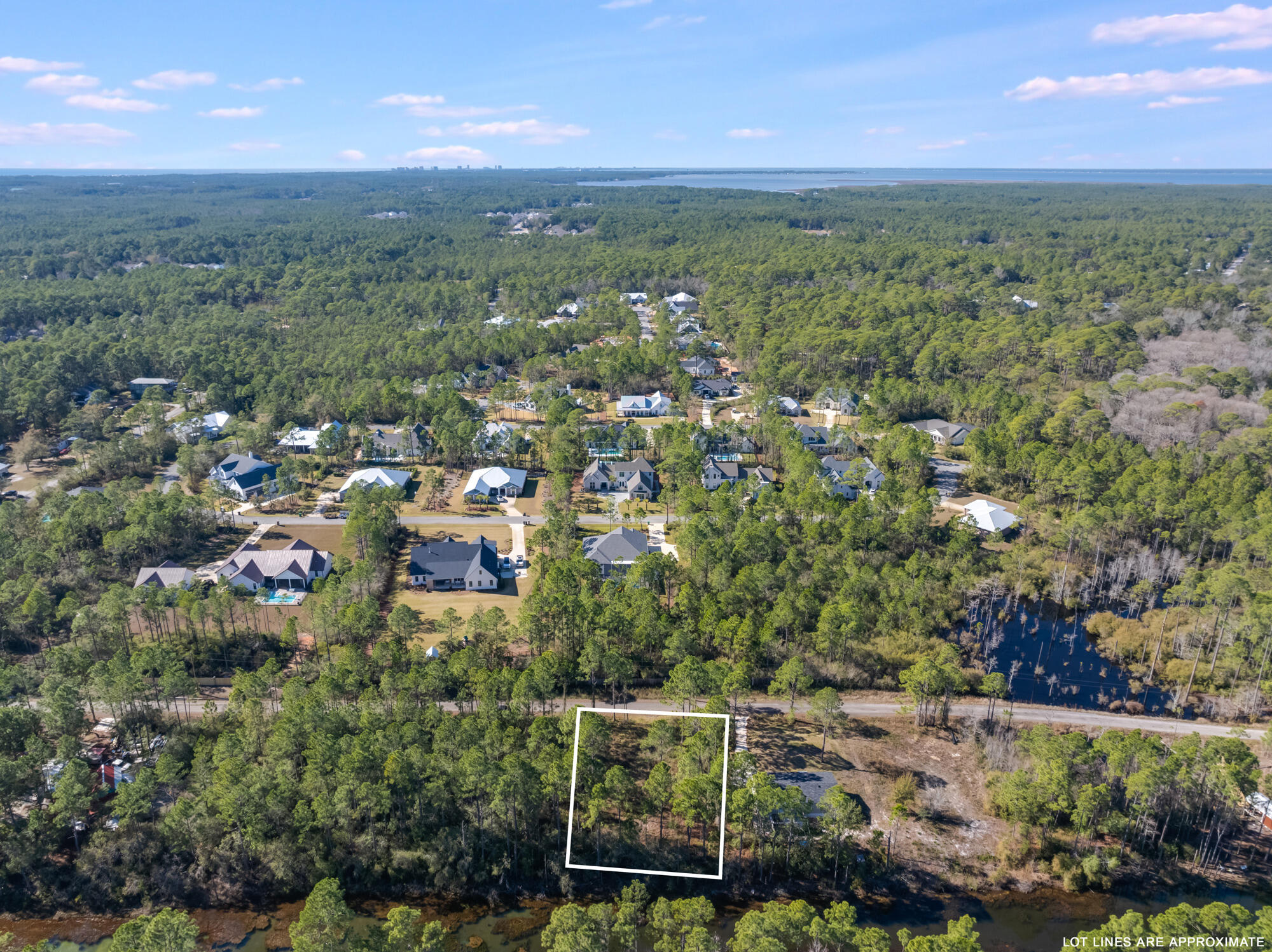 Lot 25 Rendezvous Drive Santa Rosa Beach, FL 32459 - Photo 9 of 21 an aerial view of a city