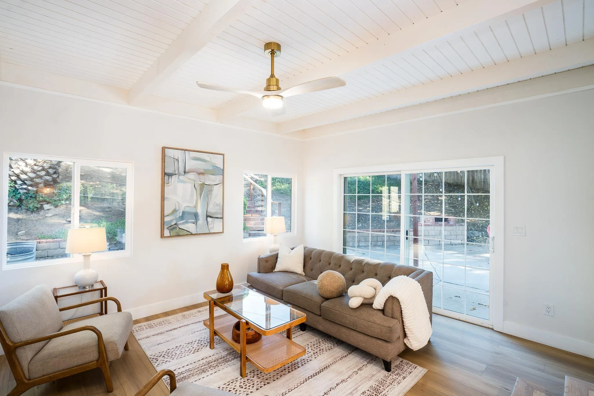 14259 Midland Road Poway, CA 92064 - Photo 14 of 60 a living room with furniture and a large window