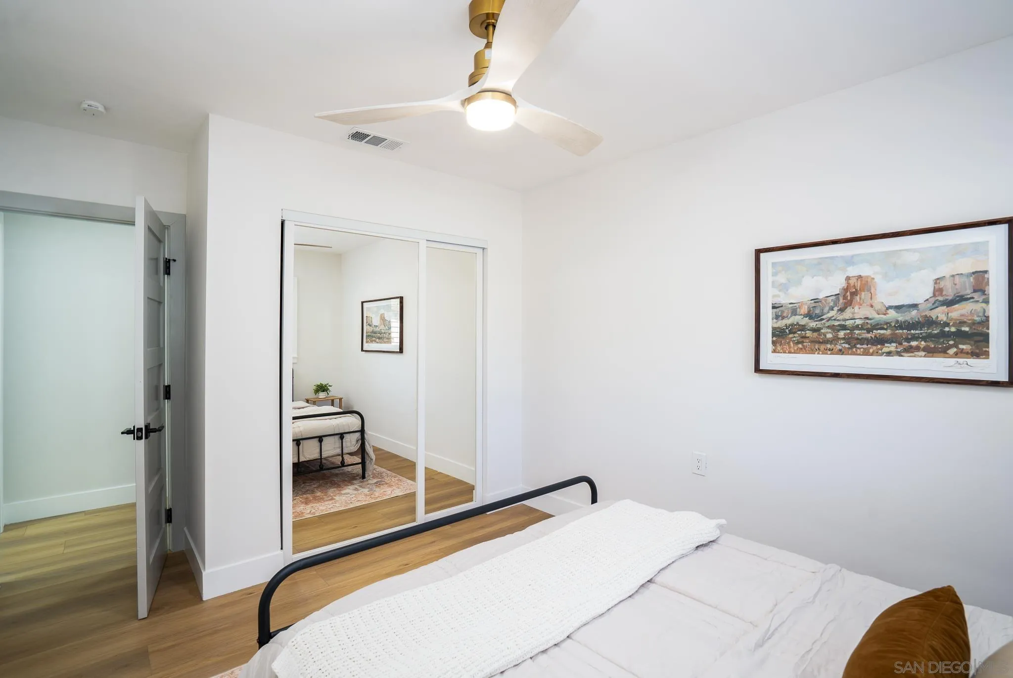 14259 Midland Road Poway, CA 92064 - Photo 26 of 60 a room with a bed and a chandelier