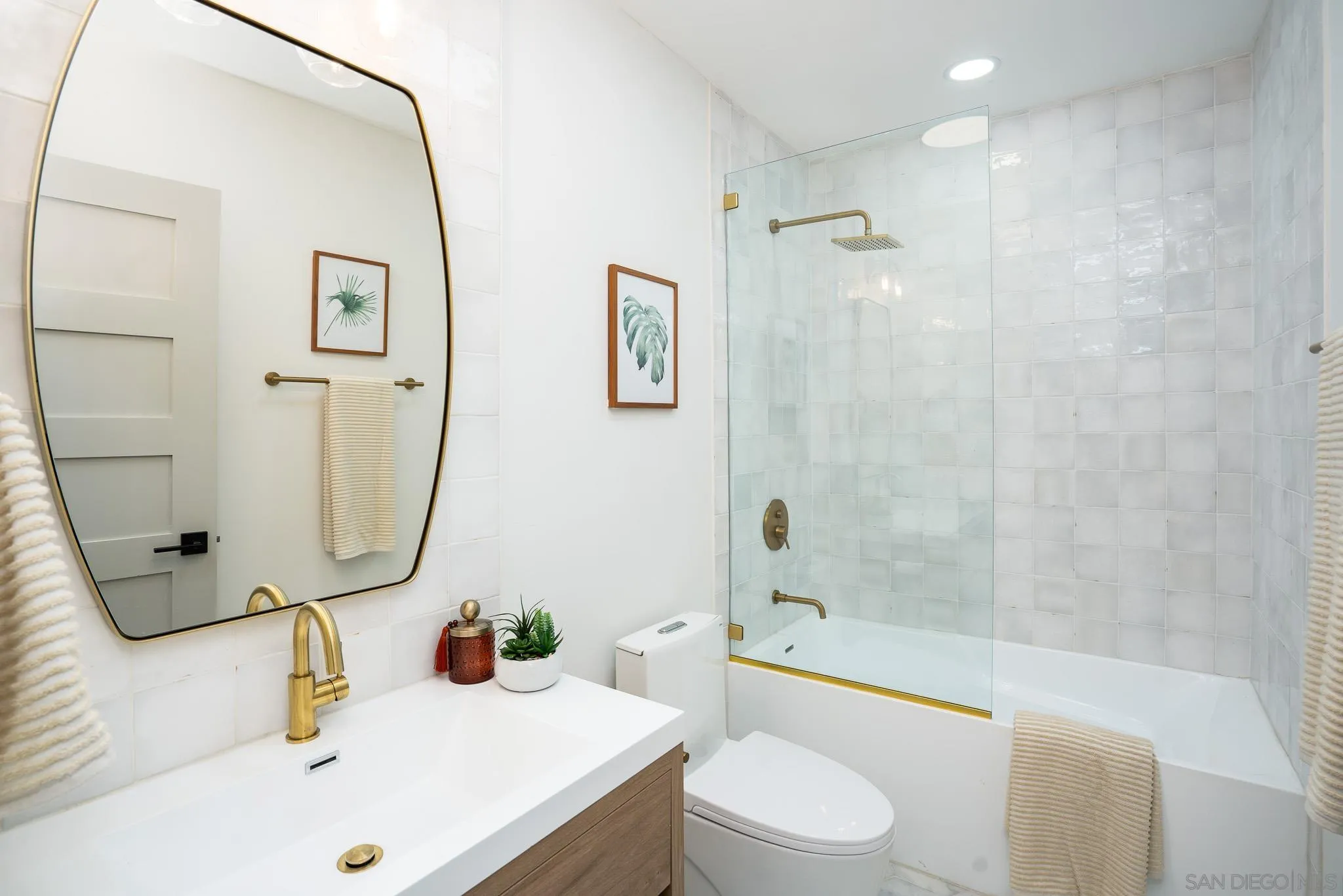 14259 Midland Road Poway, CA 92064 - Photo 27 of 60 a bathroom with a sink toilet and shower