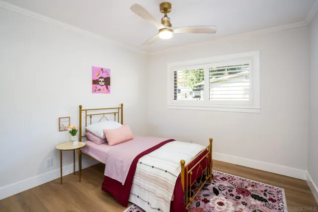 a view of a backyard with sitting area
