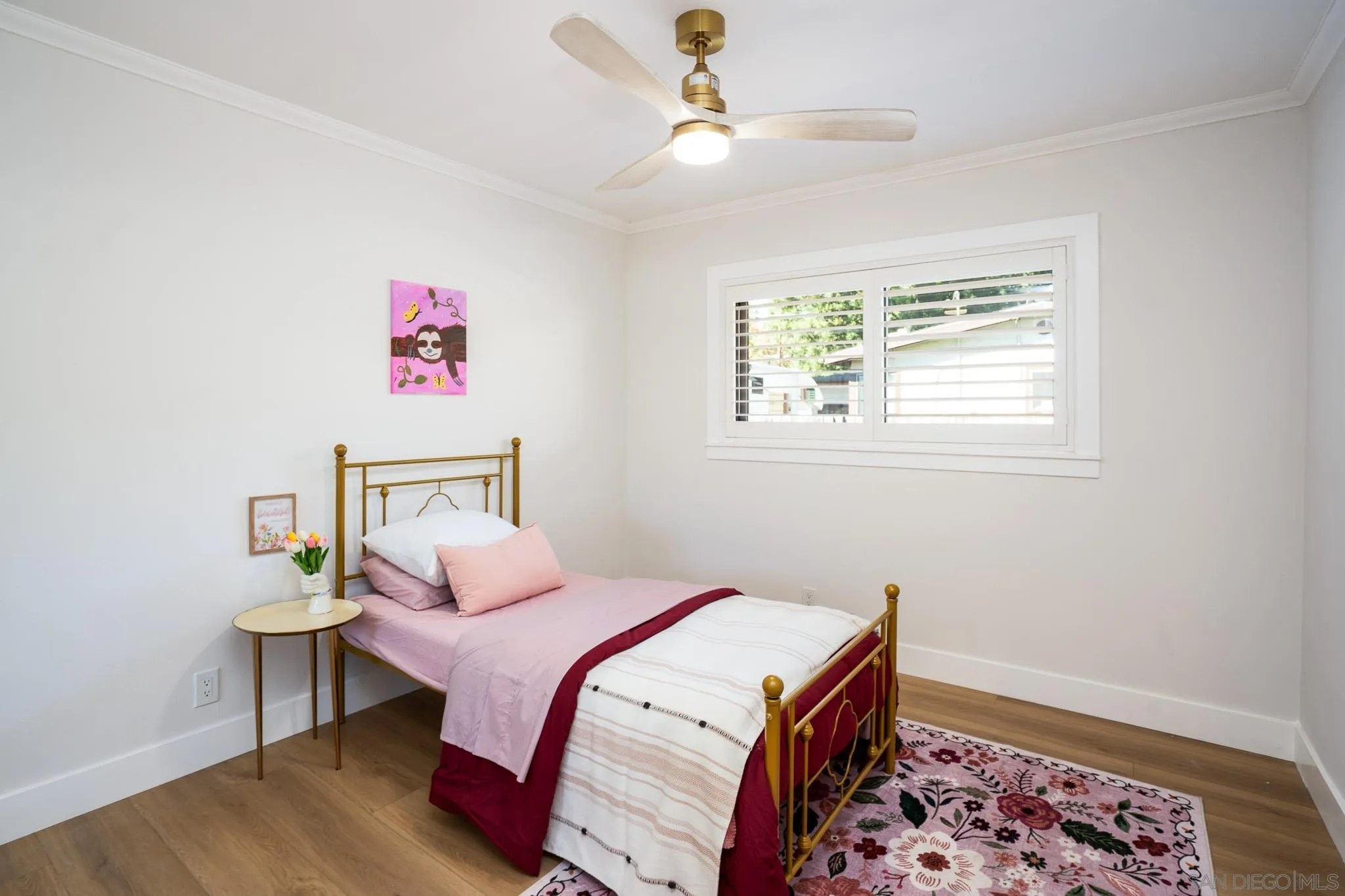 14259 Midland Road Poway, CA 92064 - Photo 28 of 60 a bedroom with a bed and a window