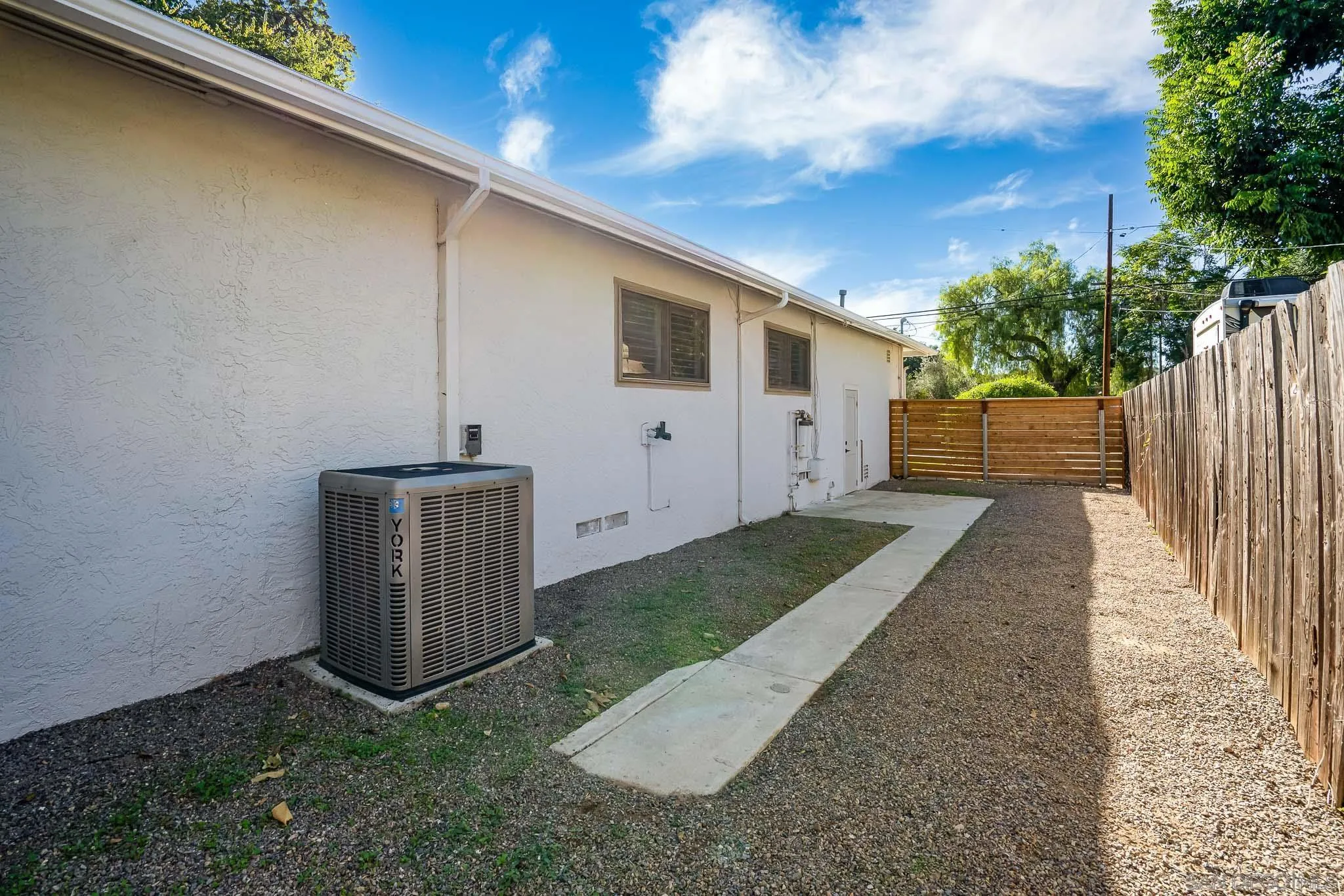 14259 Midland Road Poway, CA 92064 - Photo 43 of 60 a view of a backyard with wooden fence