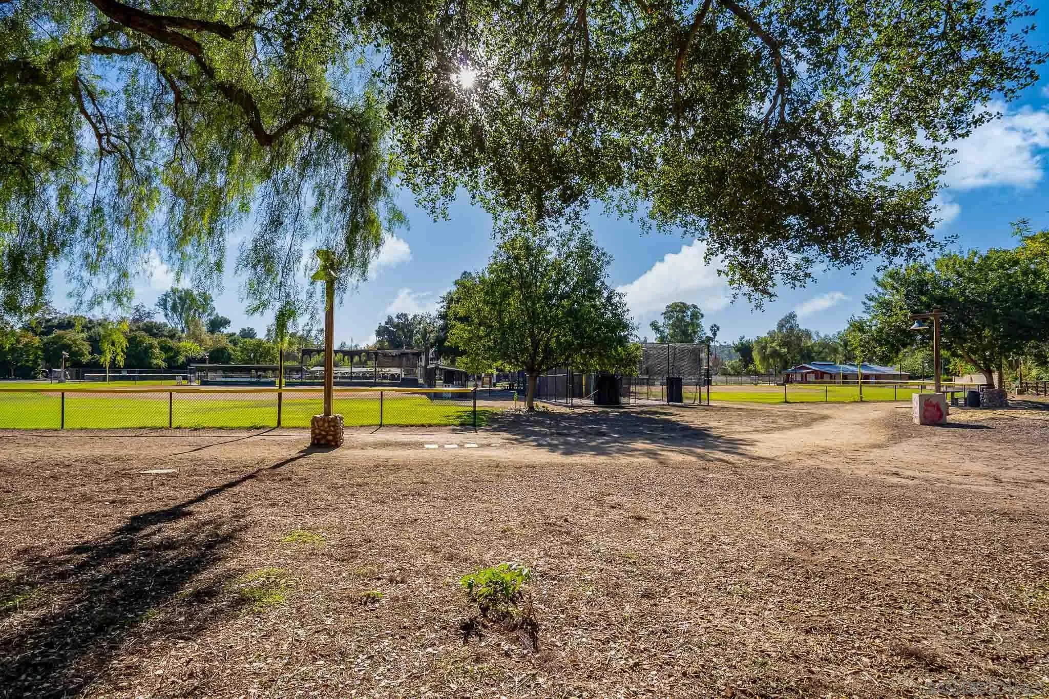 14259 Midland Road Poway, CA 92064 - Photo 49 of 60 a view of a swimming pool and sitting area