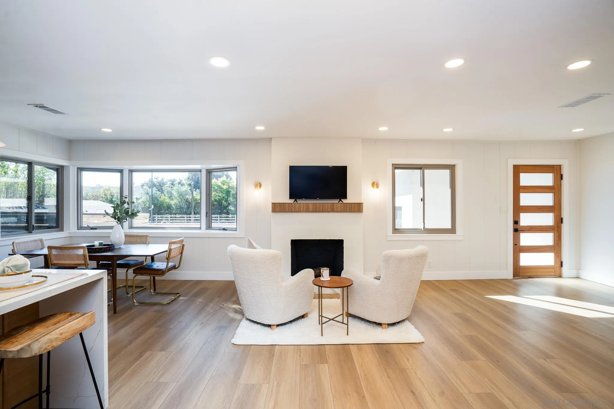 14259 Midland Road Poway, CA 92064 - Photo 5 of 60 a living room with fireplace furniture and a wooden floor