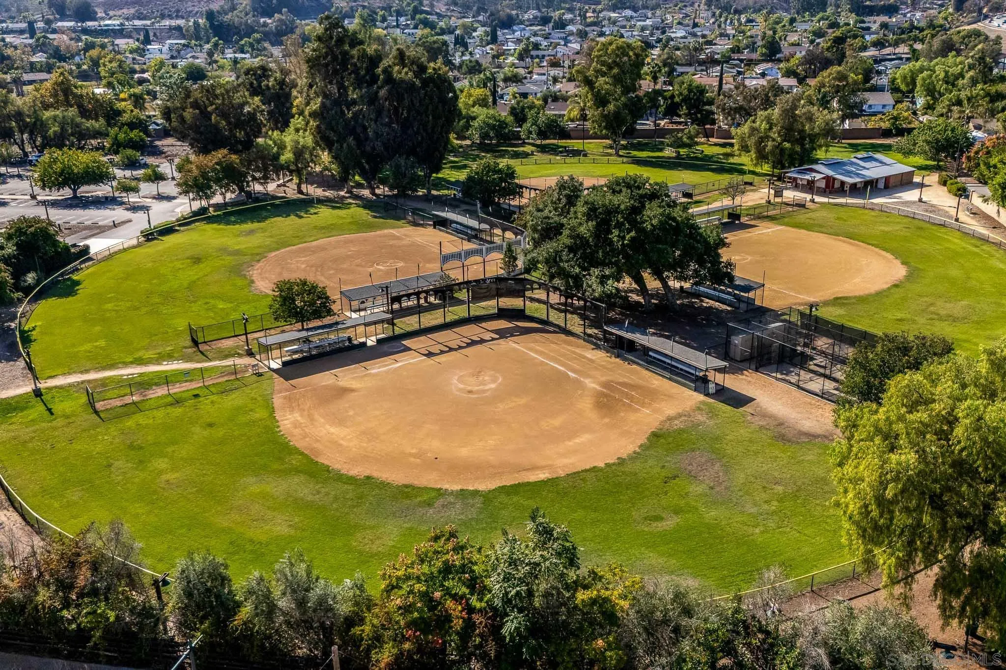 14259 Midland Road Poway, CA 92064 - Photo 58 of 60 a view of a swimming pool with a yard and outdoor seating
