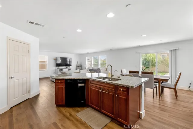 a view of a patio with a chairs and table in a patio