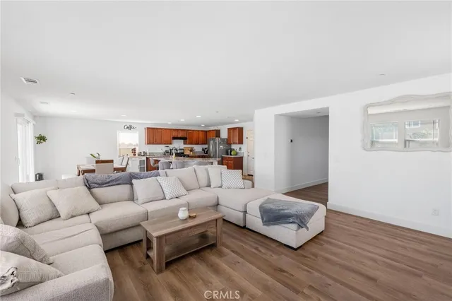 an aerial view of multiple houses with yard