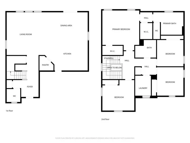 an aerial view of residential houses with city view