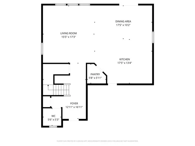 an aerial view of residential houses with a city view