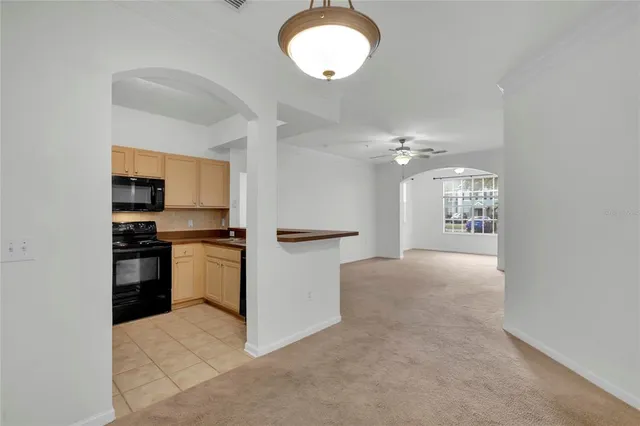 a view of a kitchen with a sink