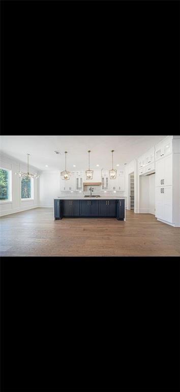 3285 Hall Road Dacula, GA 30019 - Photo 8 of 20 a view of a living room and kitchen with a sink