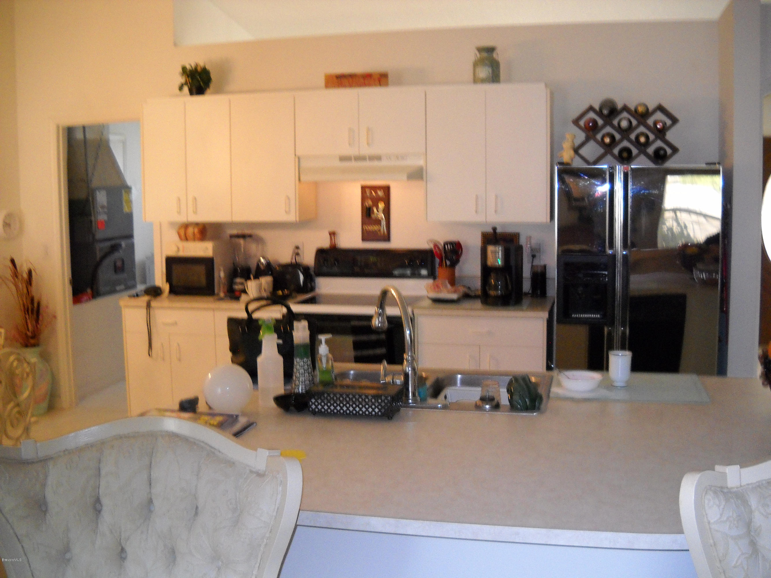 731 Schuster Road Southwest Palm Bay, FL 32908 - Photo 9 of 14 Kitchen with island