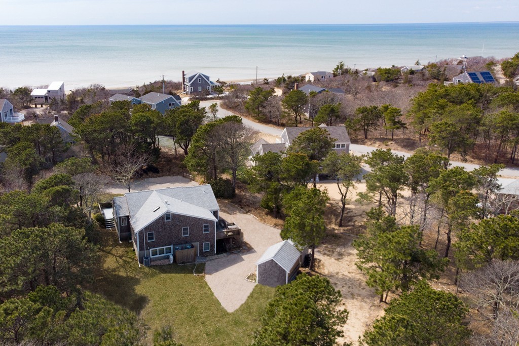 an aerial view of a house with a garden