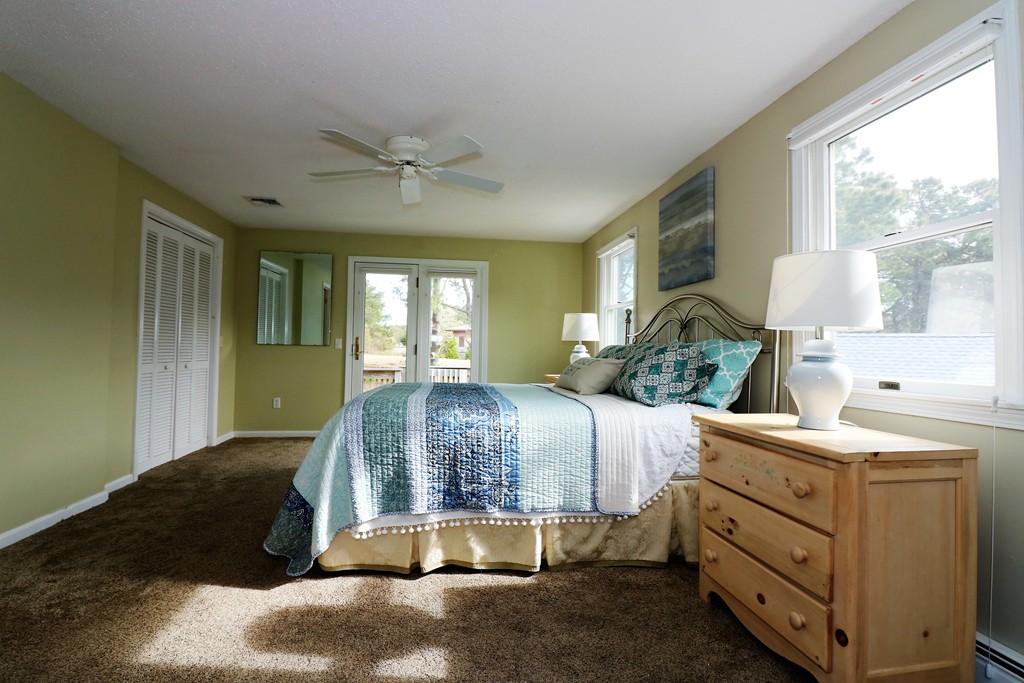 36 Ide-Ho Lane Eastham, MA 02642 - Photo 15 of 30 a bed room with a bed and a window