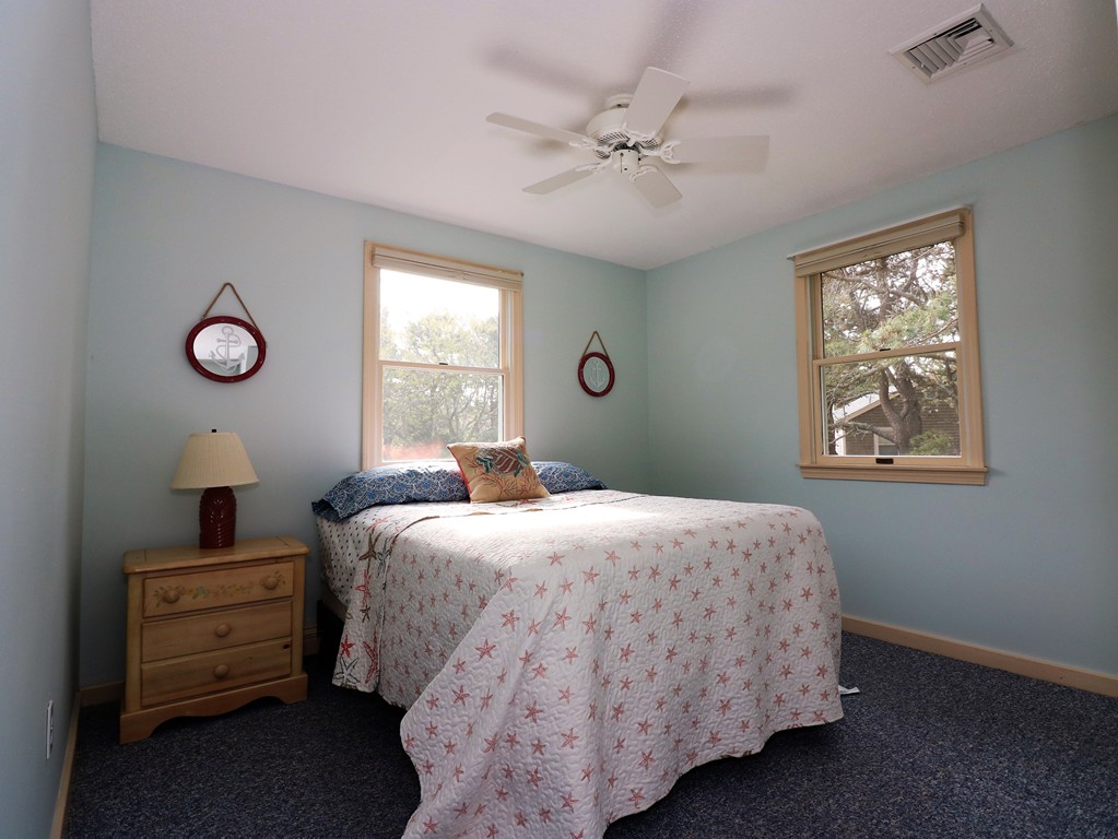 36 Ide-Ho Lane Eastham, MA 02642 - Photo 16 of 30 a bedroom with bed and window