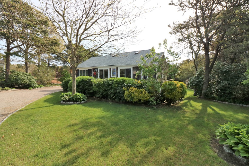 36 Ide-Ho Lane Eastham, MA 02642 - Photo 2 of 30 a view of a house with backyard and garden