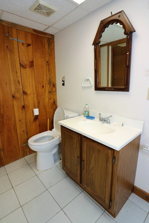 36 Ide-Ho Lane Eastham, MA 02642 - Photo 23 of 30 a bathroom with a sink vanity mirror and toilet