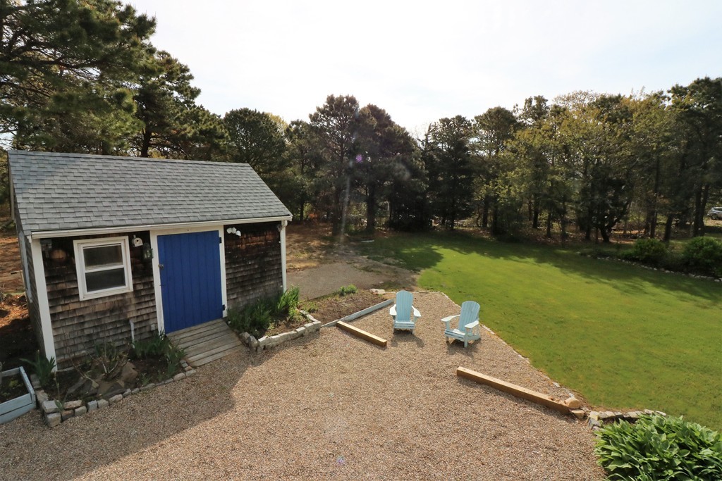 36 Ide-Ho Lane Eastham, MA 02642 - Photo 27 of 30 a aerial view of a house with garden