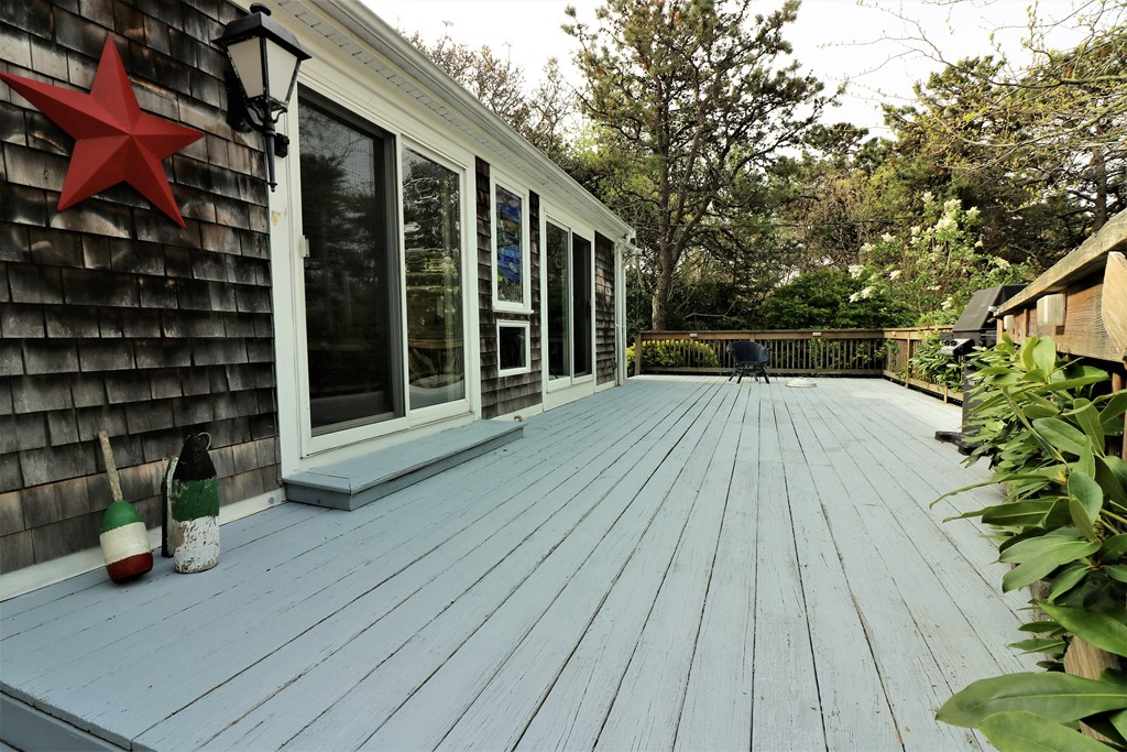 36 Ide-Ho Lane Eastham, MA 02642 - Photo 3 of 30 a view of a house with backyard and sitting area