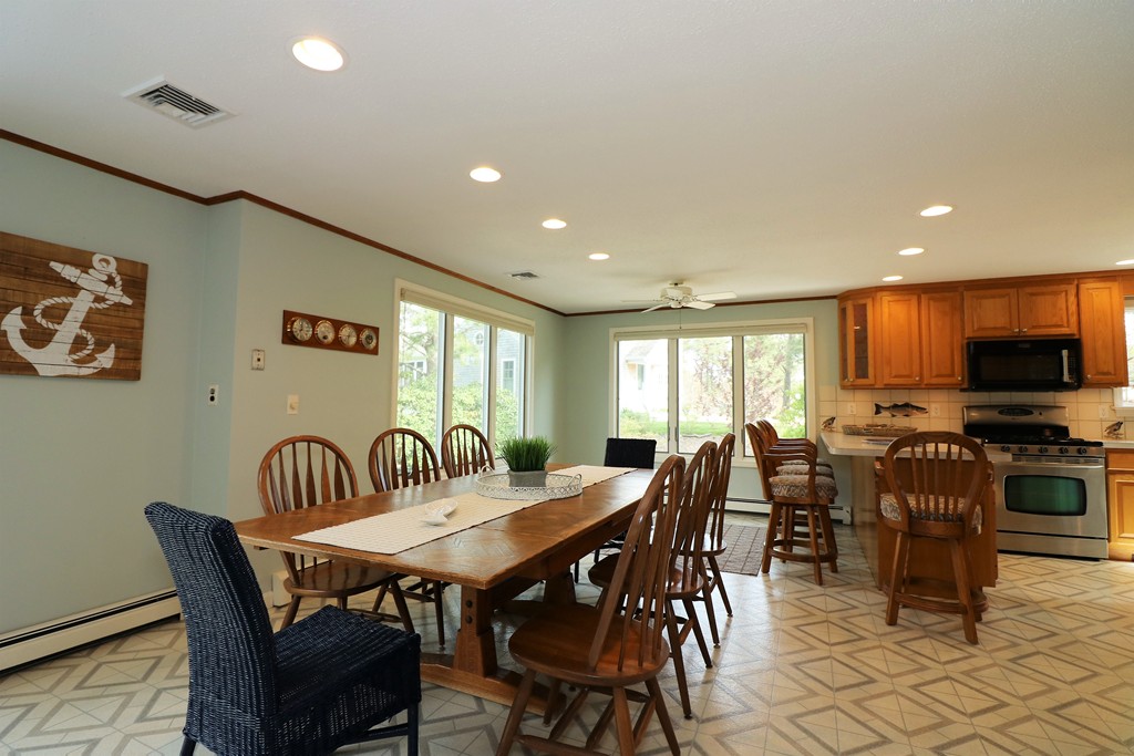 36 Ide-Ho Lane Eastham, MA 02642 - Photo 9 of 30 a view of a dining room with furniture