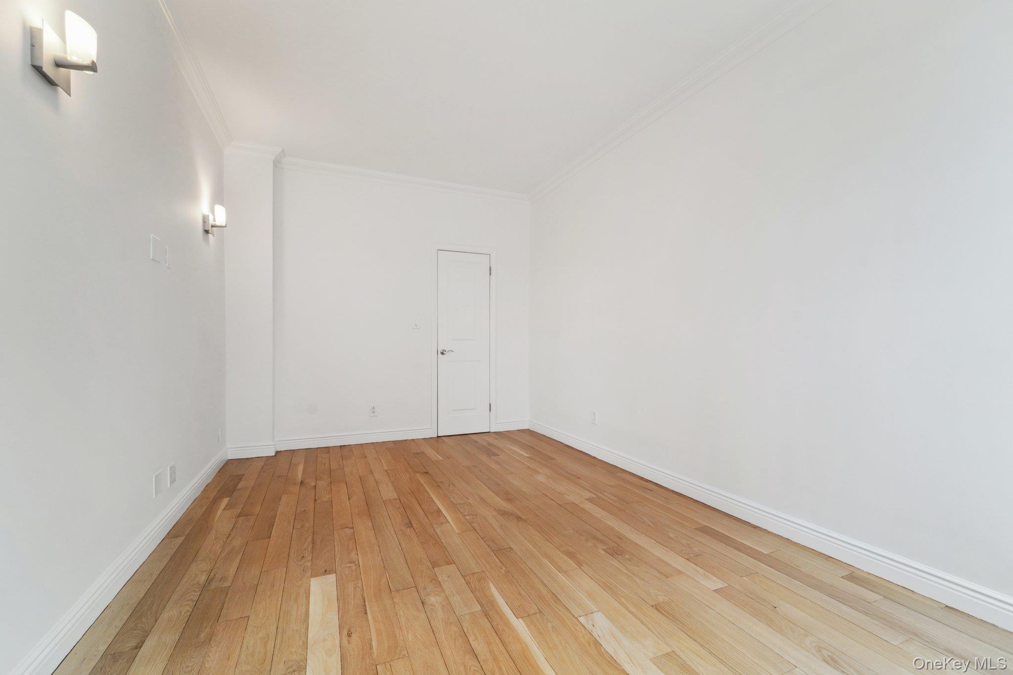 2727 Palisade Avenue, Unit 4H Bronx, NY 10463 - Photo 17 of 26 a view of empty room with wooden floor