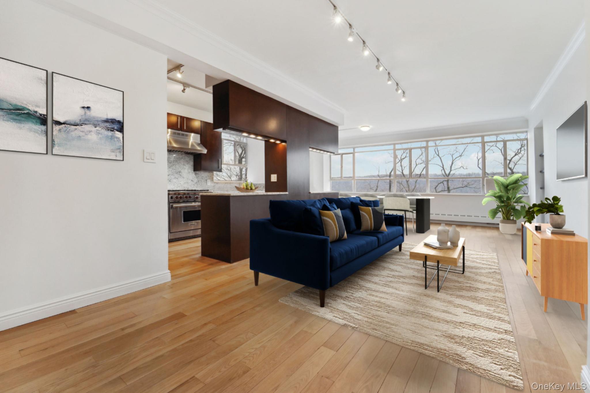 2727 Palisade Avenue, Unit 4H Bronx, NY 10463 - Photo 3 of 26 a living room with furniture and a large window