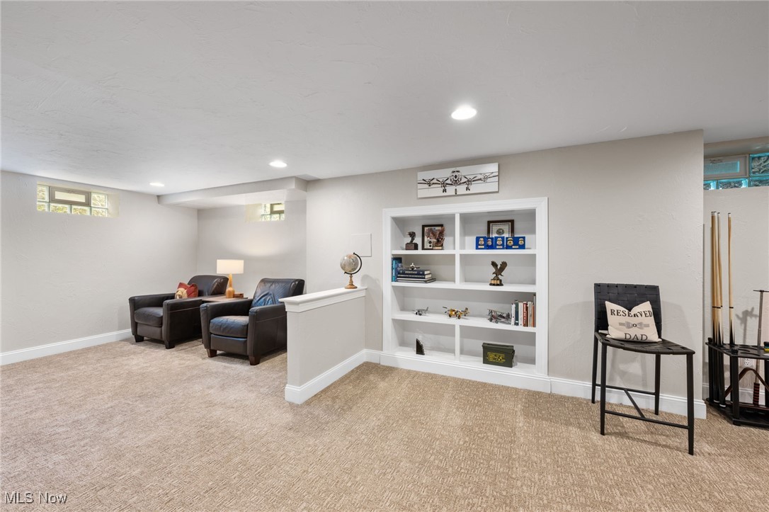 35425 Miles Road Chagrin Falls, OH 44022 - Photo 39 of 50 Living area featuring carpet flooring, built in features, baseboards, and recessed lighting