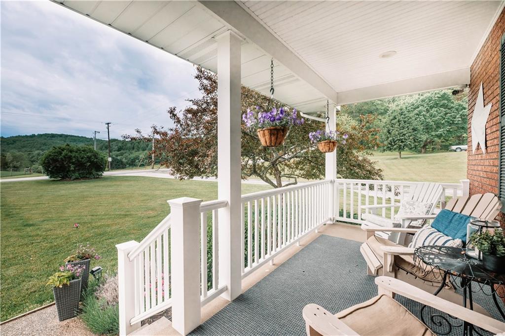 508 College Lodge Road Indiana, PA 15701 - Photo 4 of 25 a view of a balcony with wooden floor and outdoor space