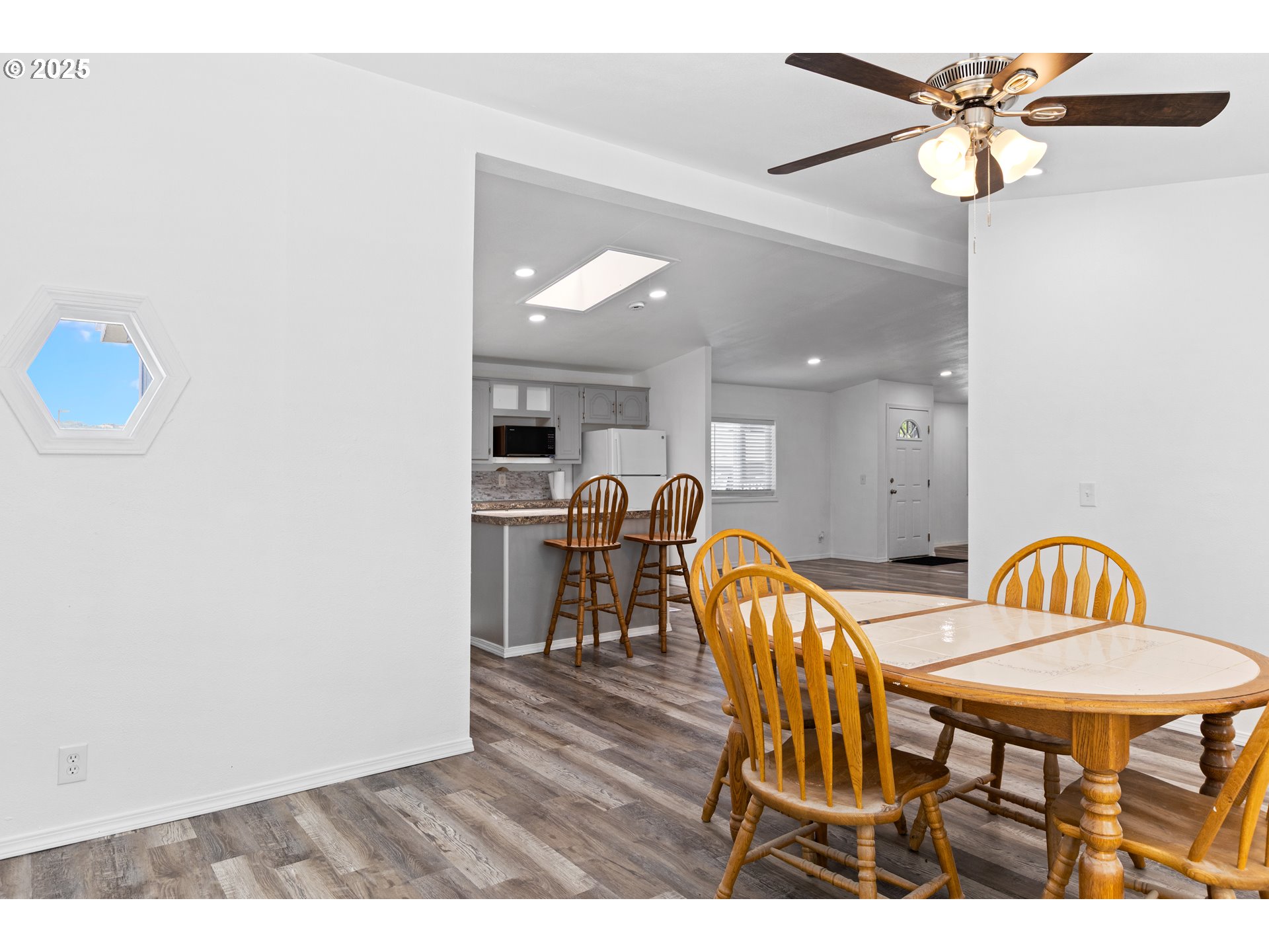 78 Manor Loop Roseburg, OR 97471 - Photo 20 of 45 a view of a dining room with furniture and a chandelier