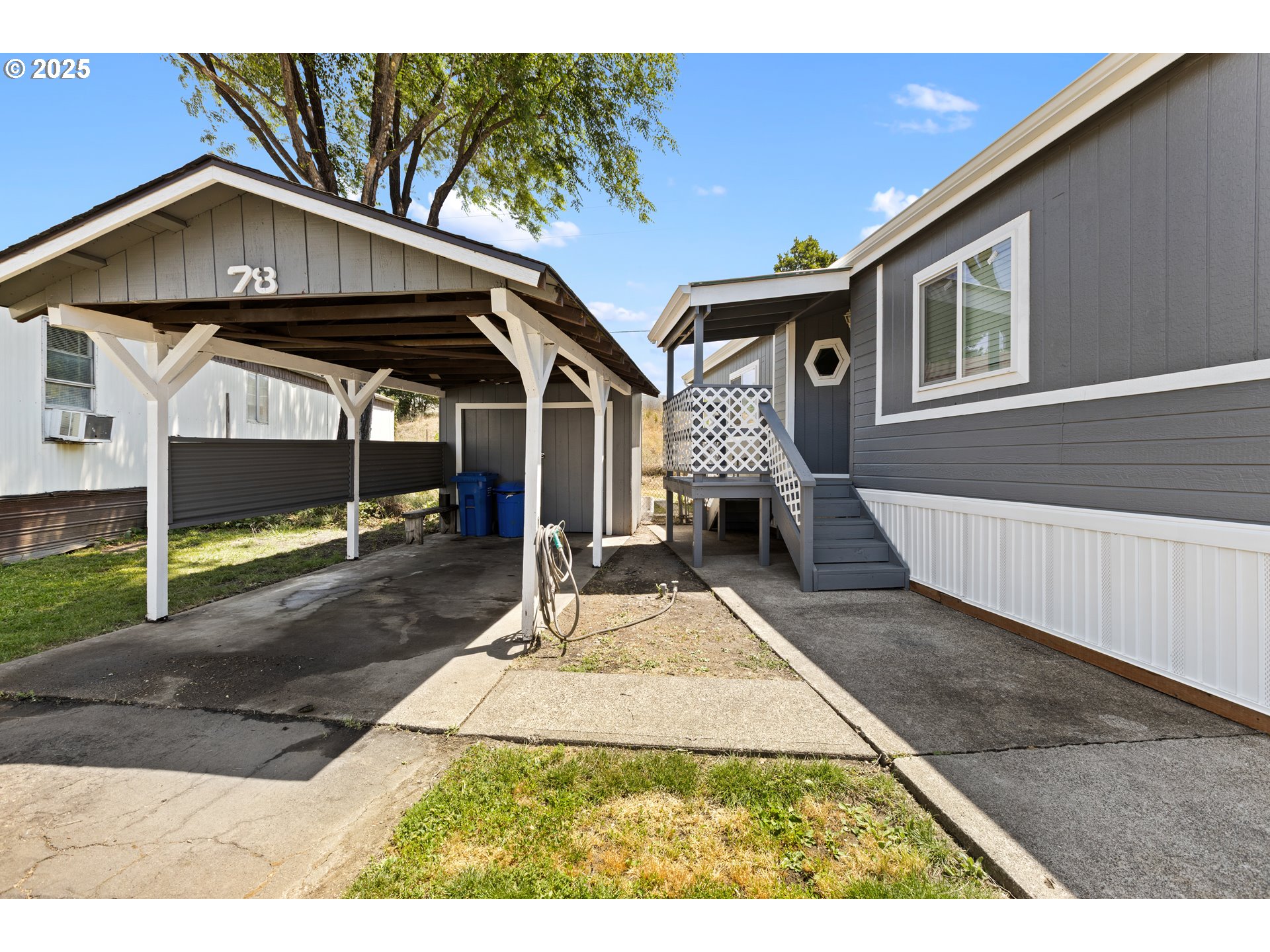 78 Manor Loop Roseburg, OR 97471 - Photo 3 of 45 a front view of a house with a yard