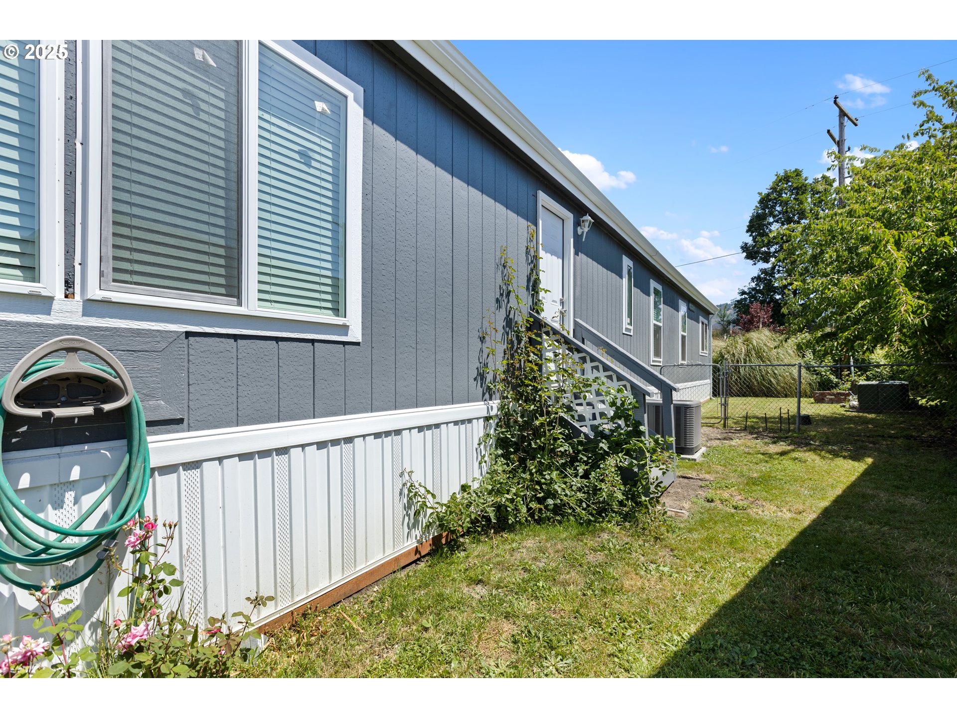 78 Manor Loop Roseburg, OR 97471 - Photo 40 of 45 a view of a house with backyard and sitting area