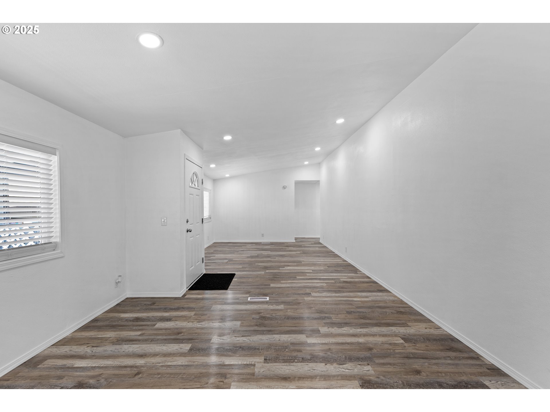 78 Manor Loop Roseburg, OR 97471 - Photo 5 of 45 a view of empty room with wooden floor