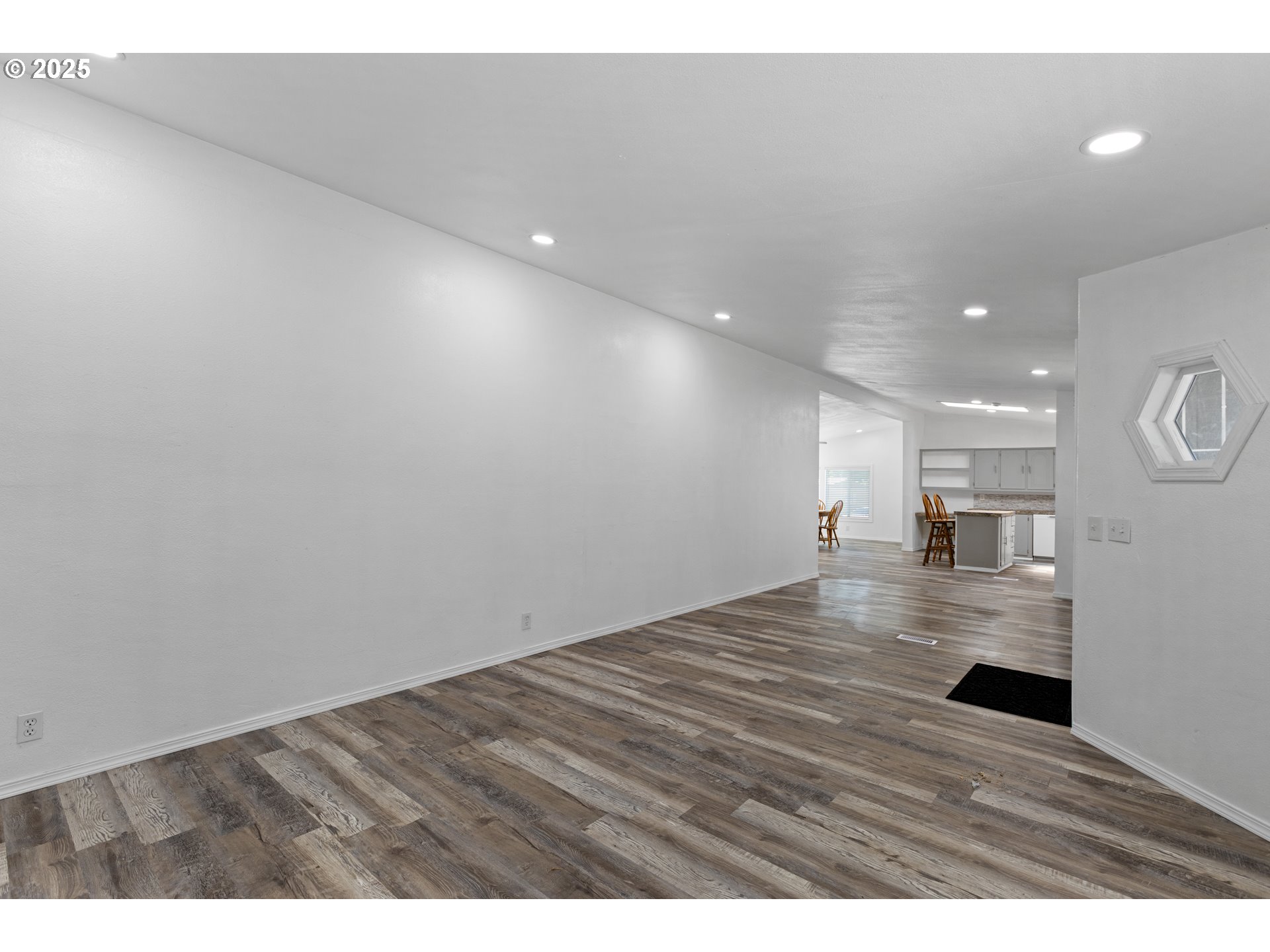 78 Manor Loop Roseburg, OR 97471 - Photo 9 of 45 a view of empty room with wooden floor