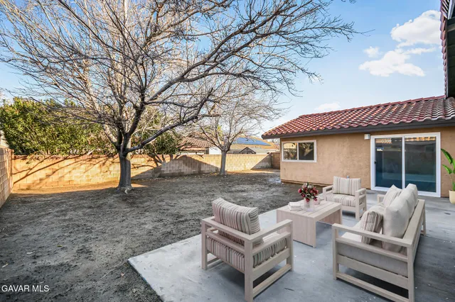 a view of a house with a patio