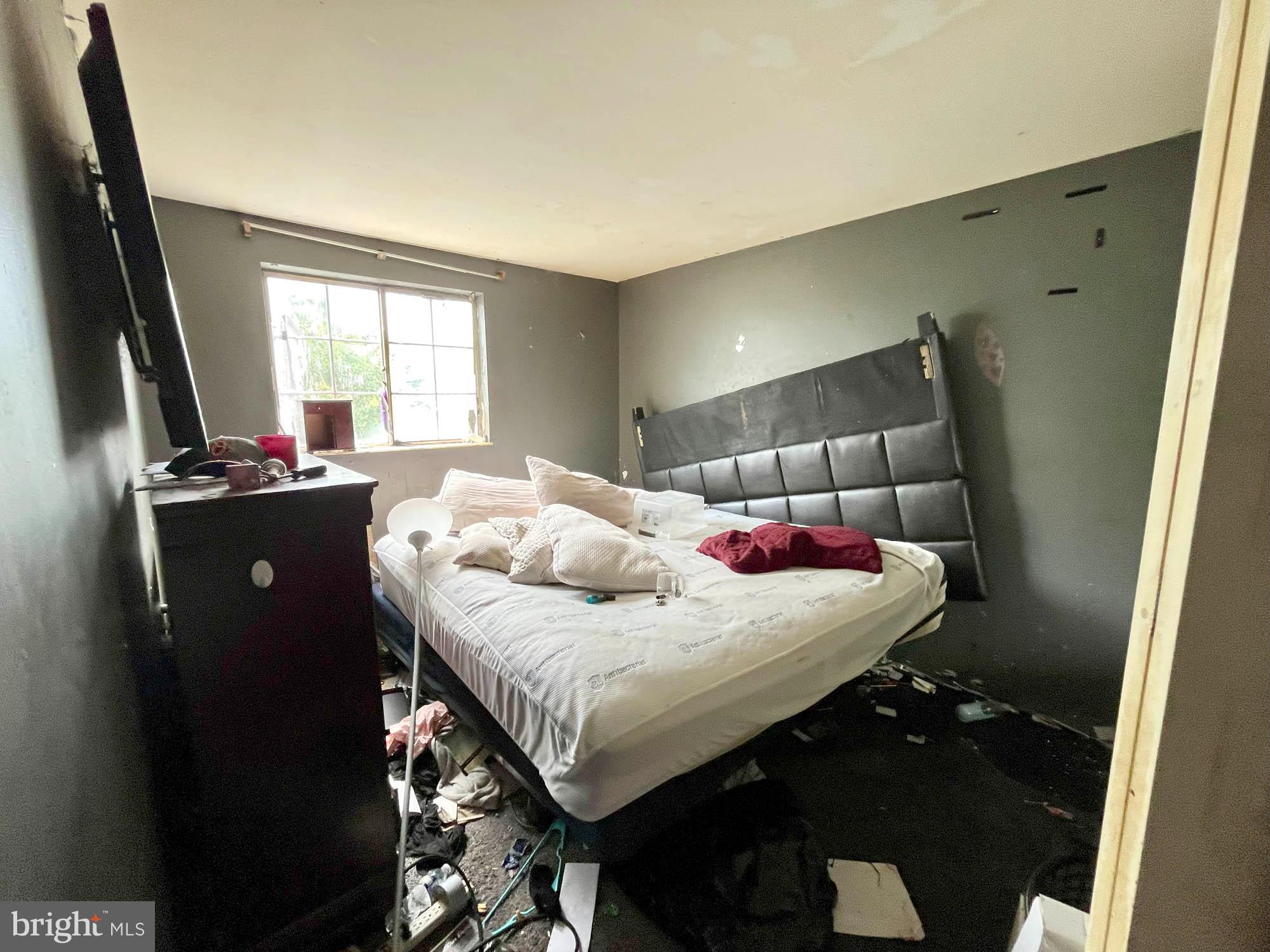 12366 Bonfire Drive Reisterstown, MD 21136 - Photo 14 of 20 a bedroom with a bed and window