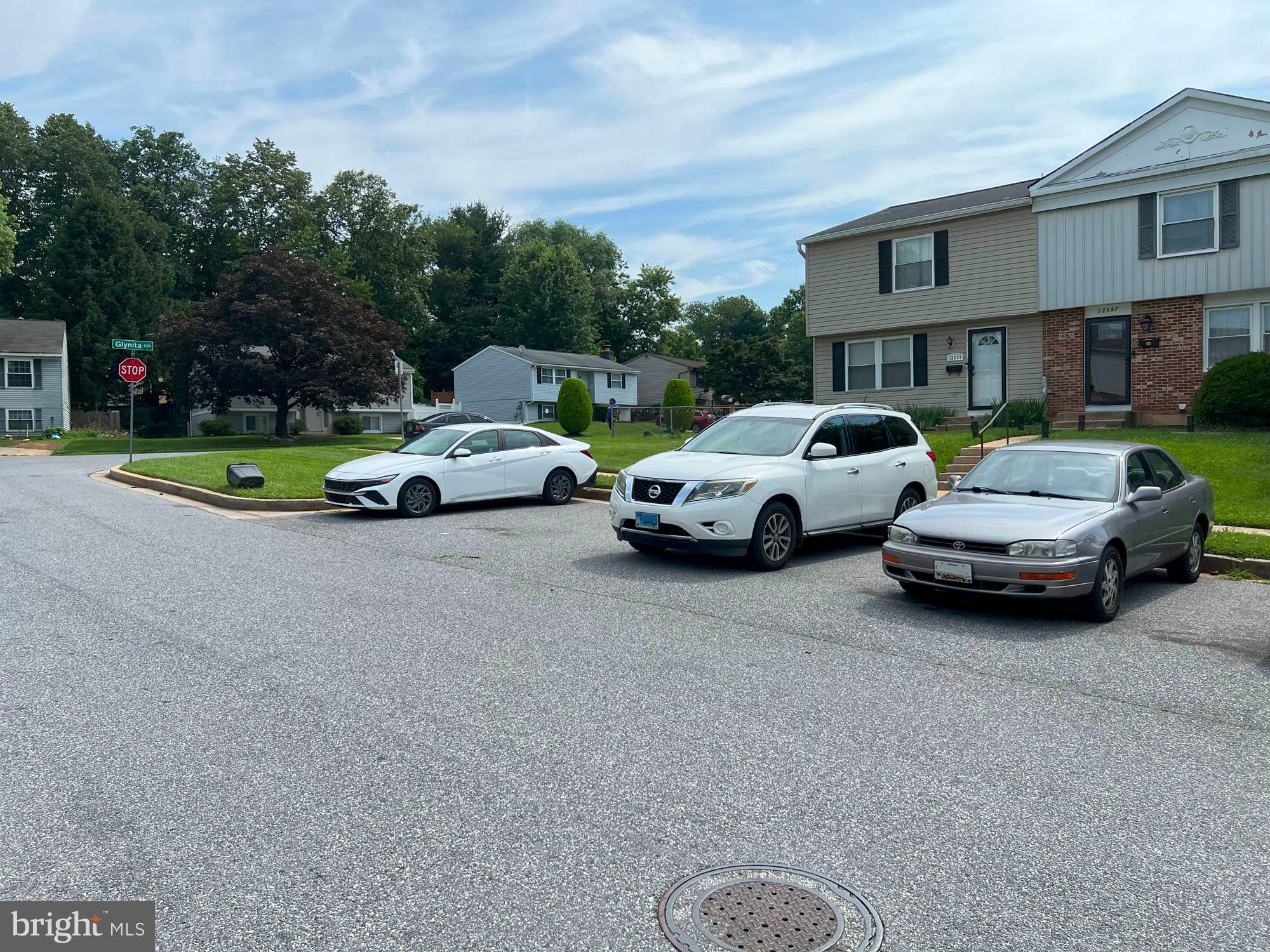 12366 Bonfire Drive Reisterstown, MD 21136 - Photo 3 of 20 a view of a cars parked in front of a house
