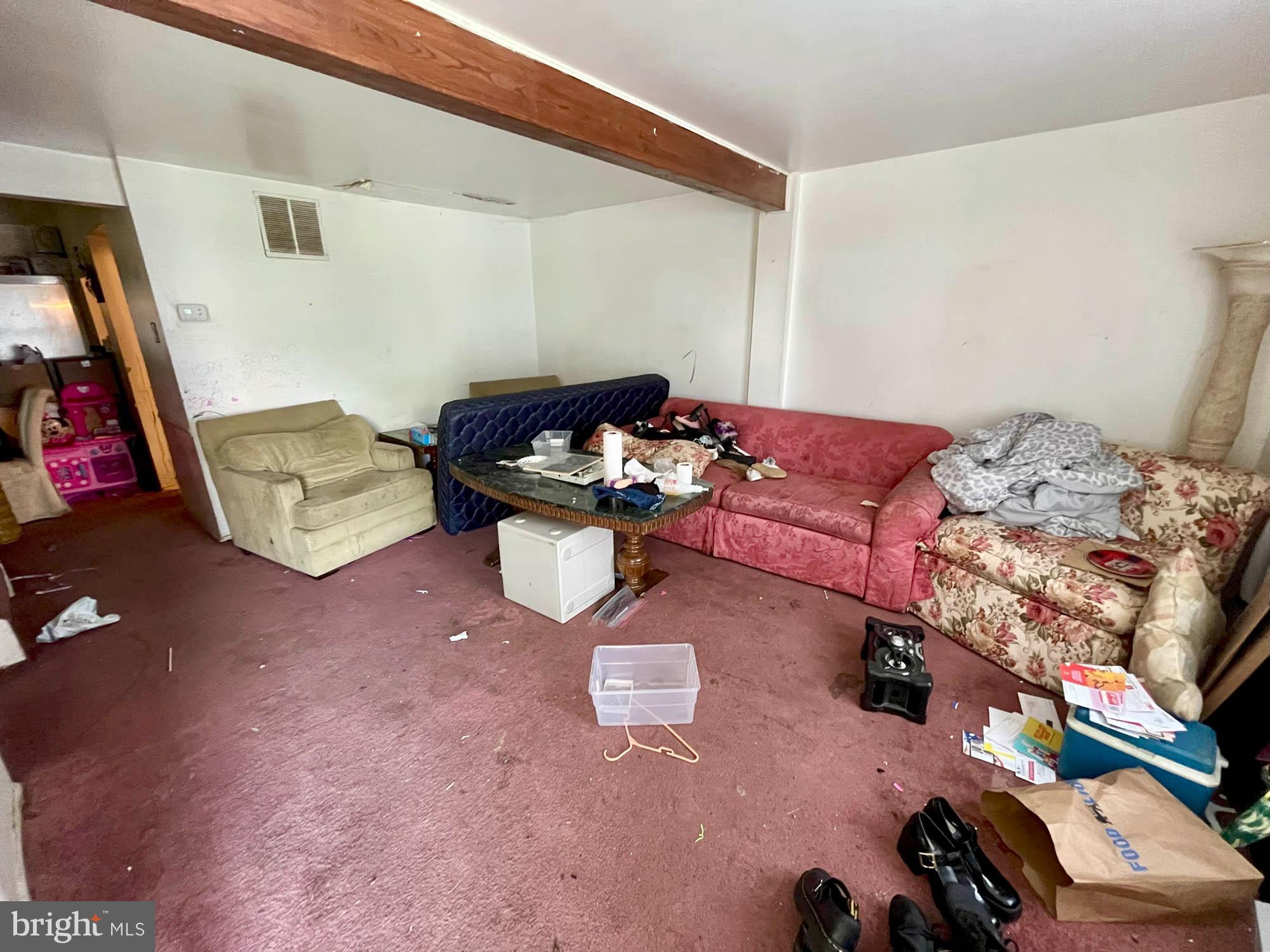 12366 Bonfire Drive Reisterstown, MD 21136 - Photo 6 of 20 a living room with furniture and a couch