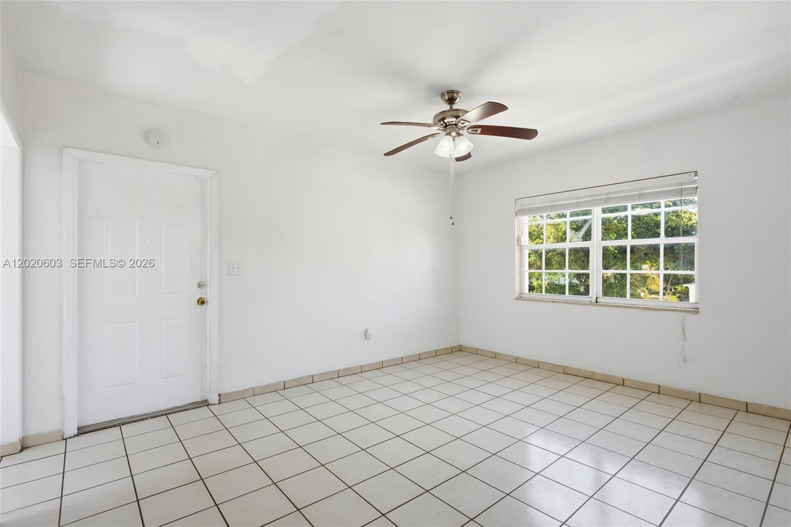 3750 Southwest 27th Street Miami, FL 33134 - Photo 17 of 41 a view of an empty room with a window