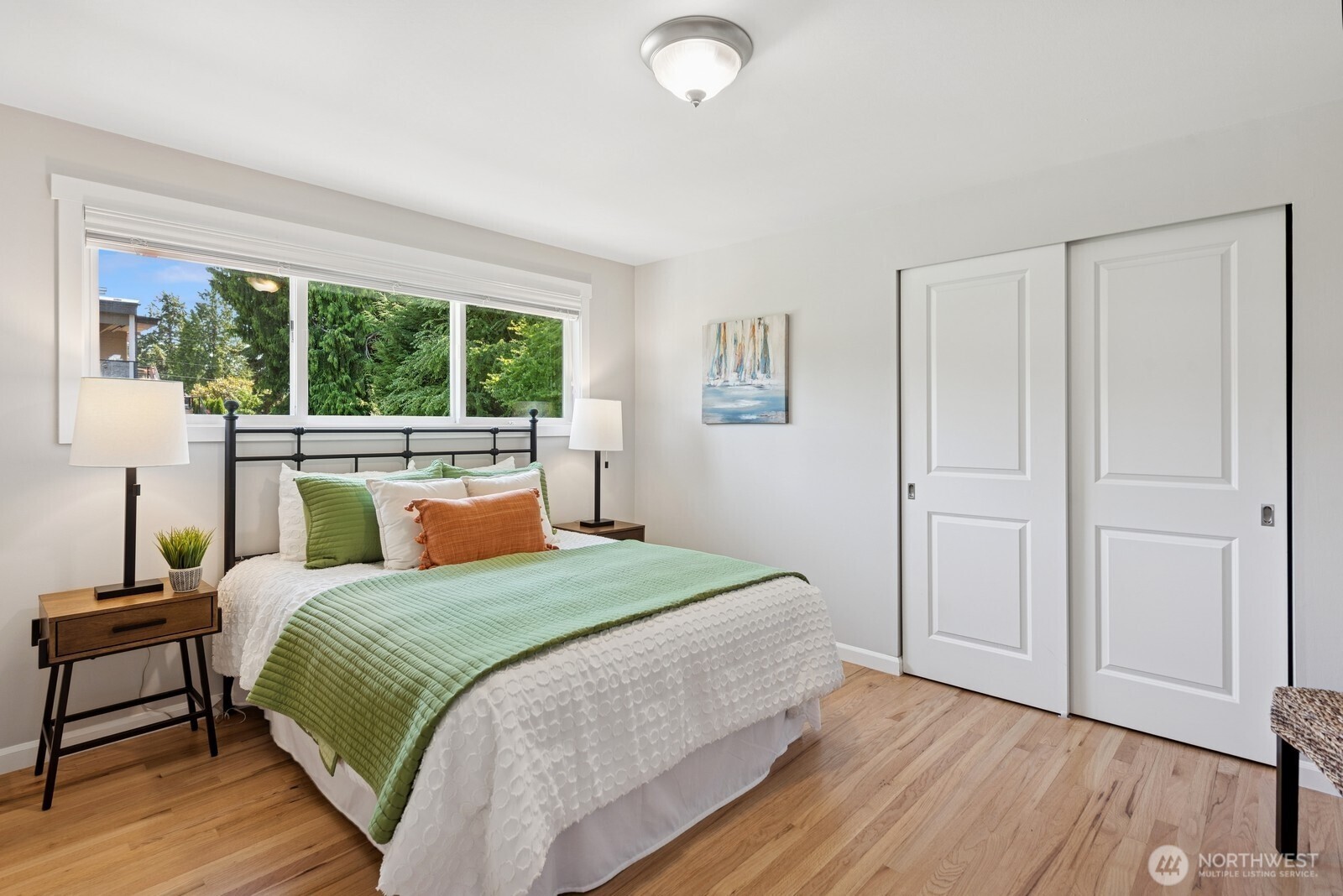 918 Daley Street Edmonds, WA 98020 - Photo 12 of 32 a bedroom with a bed and a large window