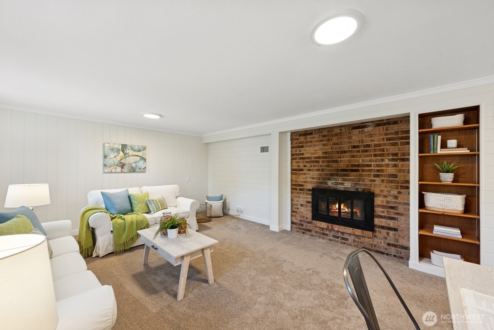 918 Daley Street Edmonds, WA 98020 - Photo 17 of 32 a living room with furniture and a fireplace
