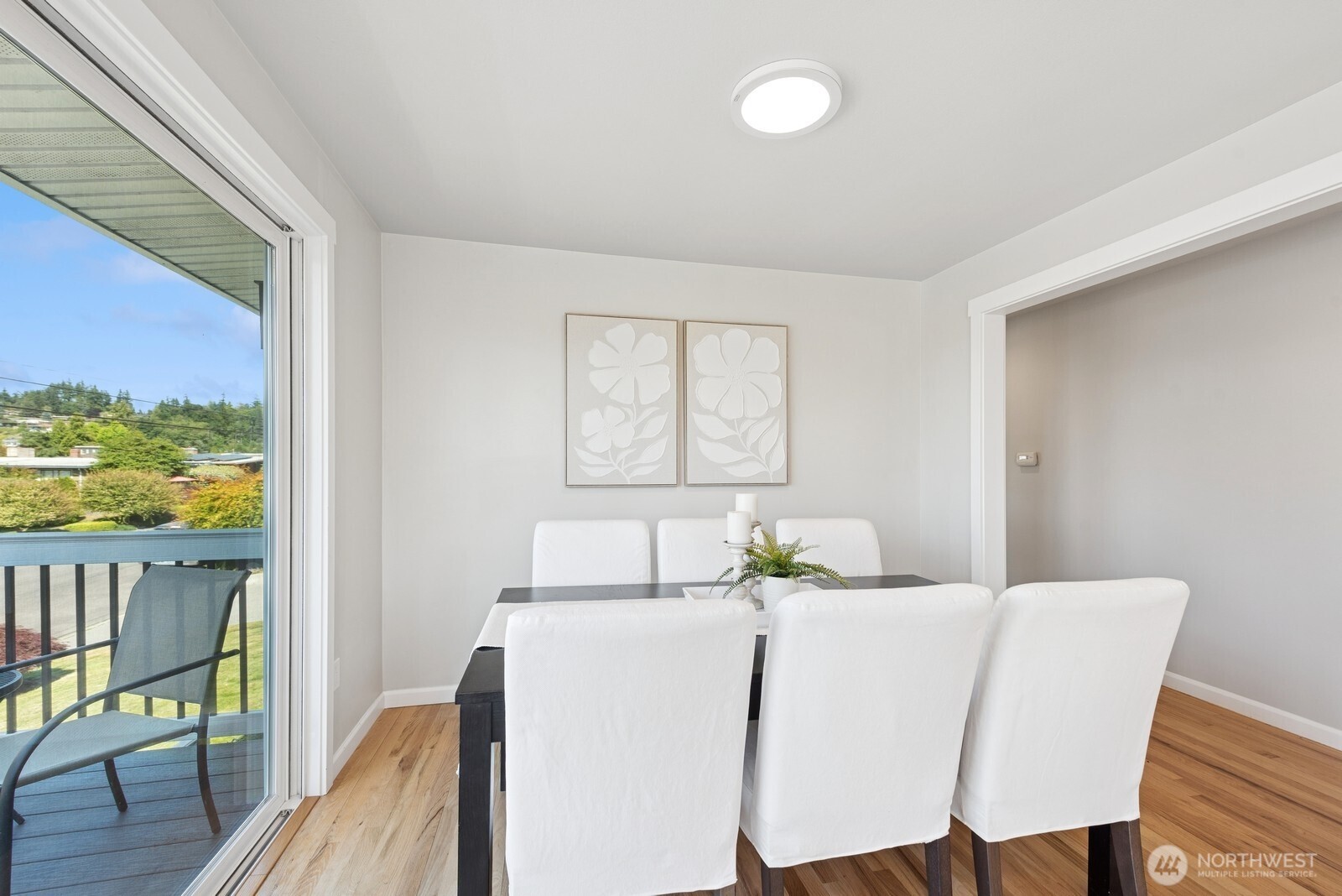 918 Daley Street Edmonds, WA 98020 - Photo 8 of 32 a dining room with furniture a rug and wooden floor