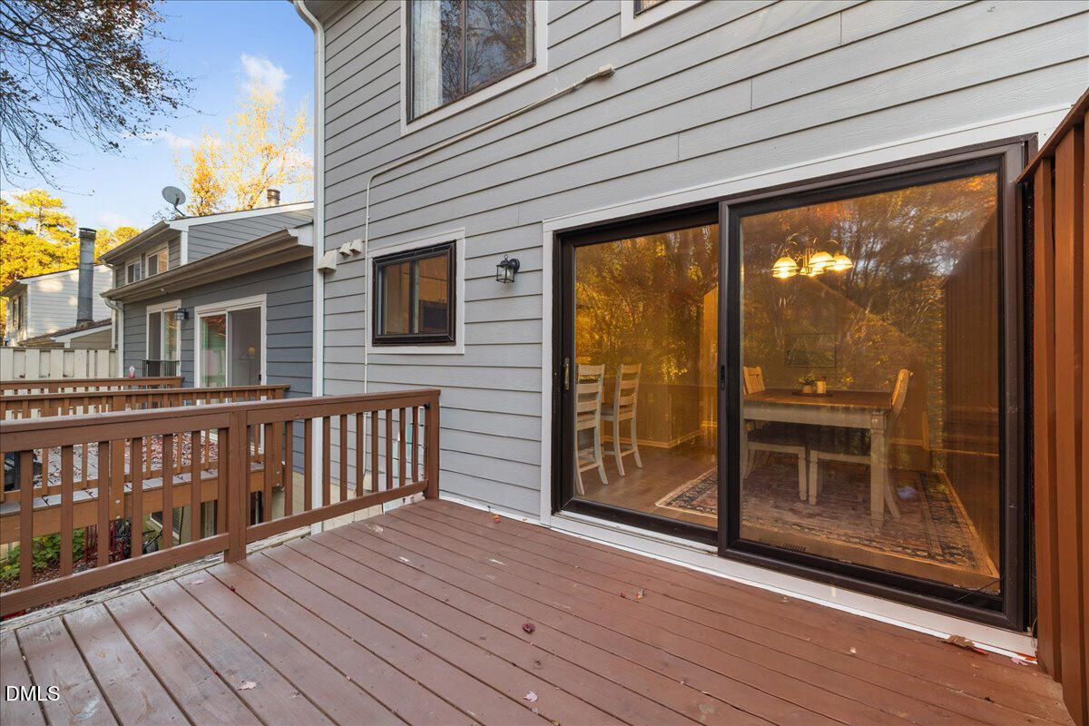 5821 Mapleridge Road Raleigh, NC 27609 - Photo 17 of 38 a view of a balcony with wooden floor