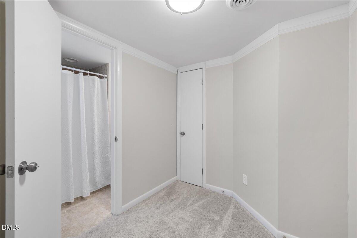 5821 Mapleridge Road Raleigh, NC 27609 - Photo 30 of 38 a view of an empty room