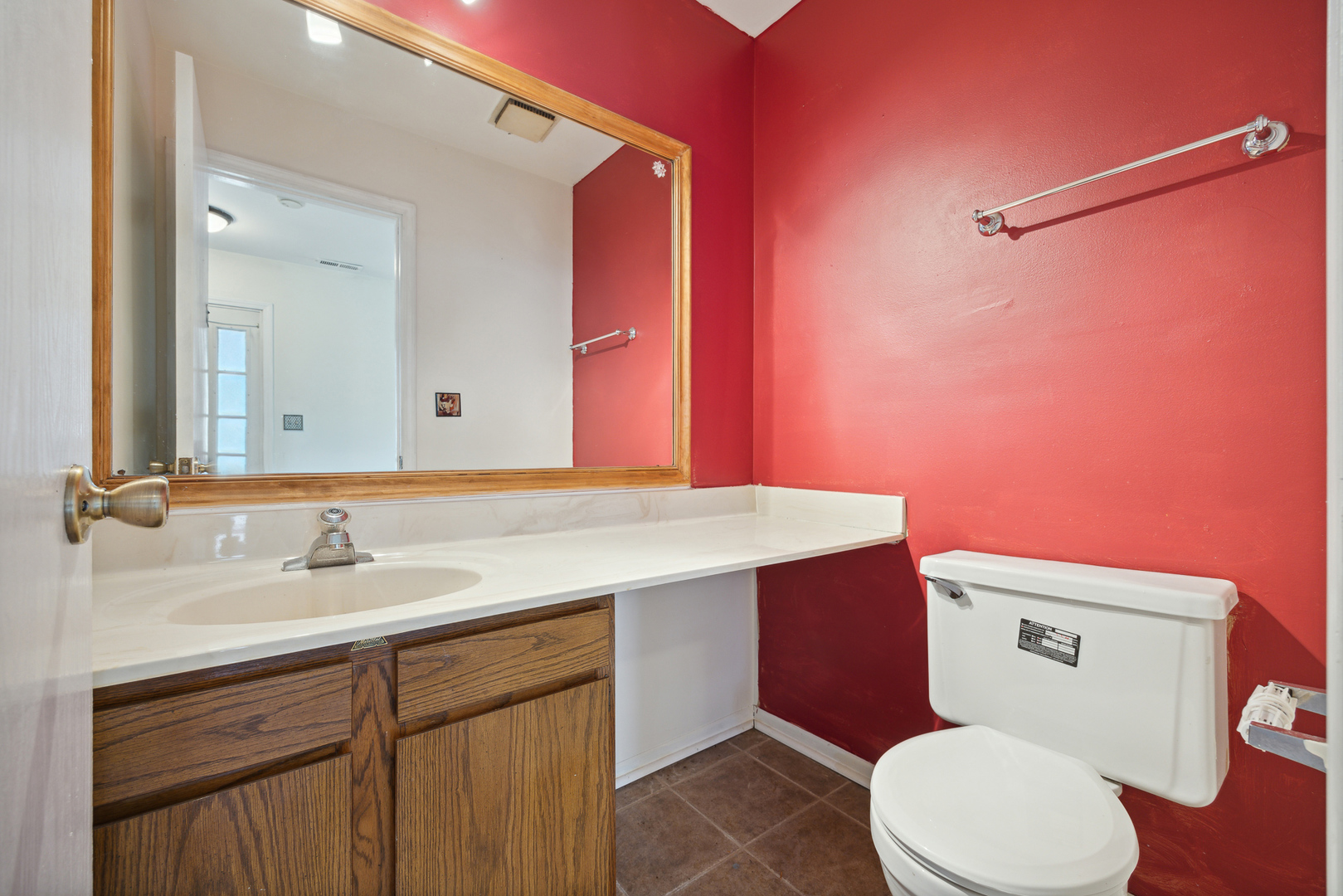 9 Red Barn Road Matteson, IL 60443 - Photo 11 of 18 a bathroom with a sink vanity mirror and toilet
